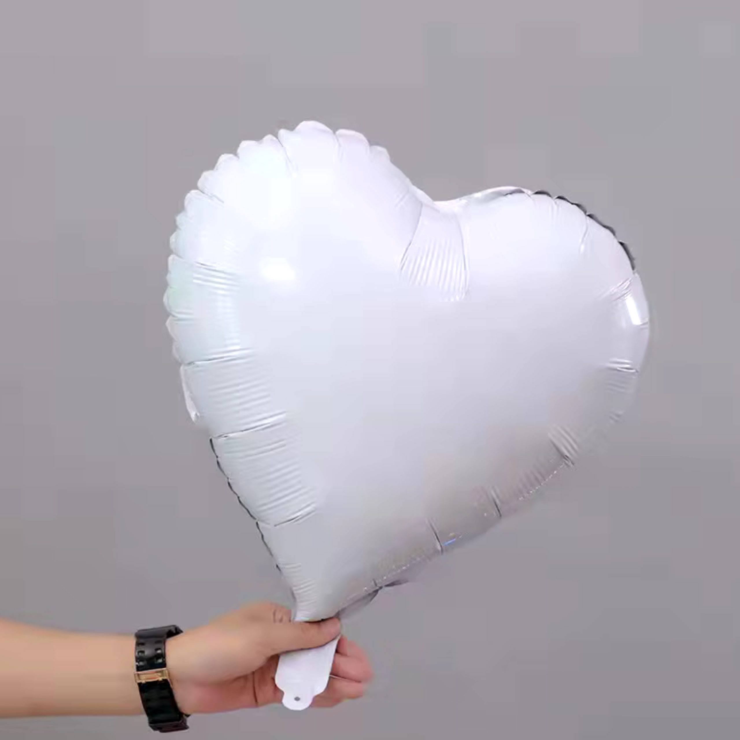 b-26-scaled-1.jpg 18" White Heart Shape Metallic Foil Balloon (Unpacked) - Image 1