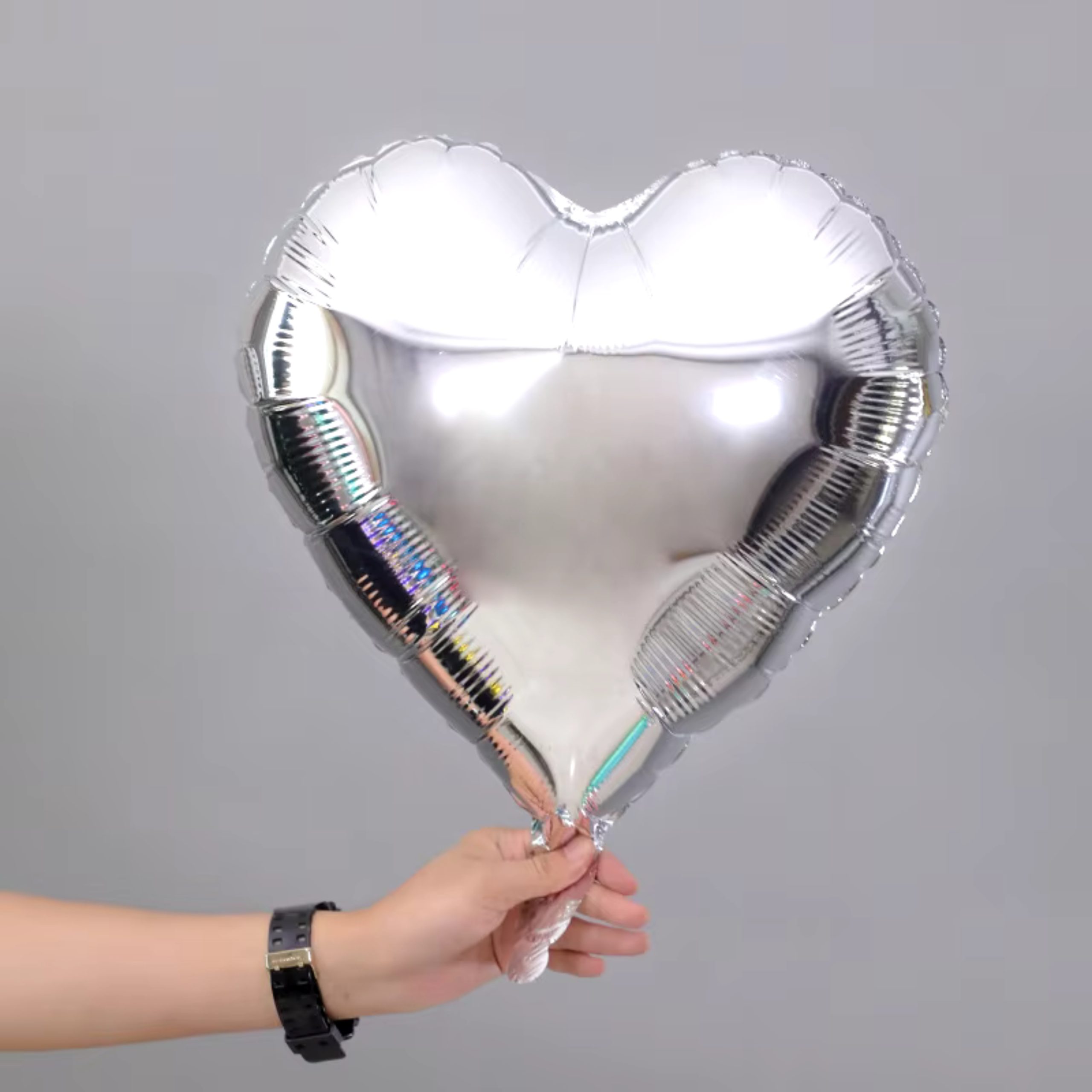 b-36-scaled-1.jpg 18" Silver Heart Shape Metallic Foil Balloon (Unpacked) - Image 1