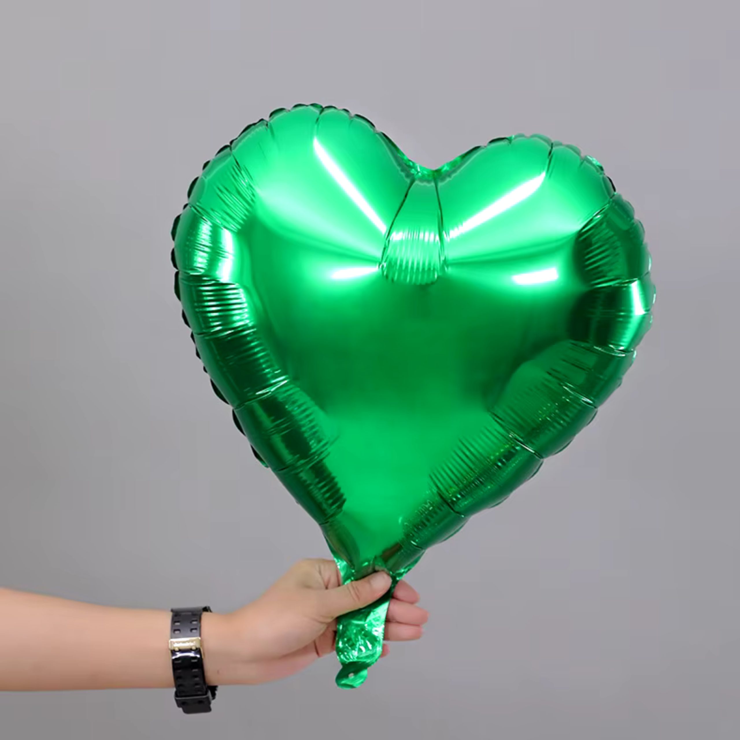 b-9-scaled-1.jpg 18" Green Heart Shape Metallic Foil Balloon (Unpacked) - Image 1